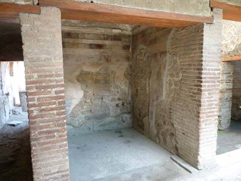 Villa of Mysteries, Pompeii. May 2010. Room 42, the apodyterium or changing room. Looking east. According to NdS, this room originally numbered 6, had a white mosaic floor and a vaulted ceiling. The walls were decorated in the II style, but it was badly preserved.
See Notizie di Scavi, 1910, p.141.

