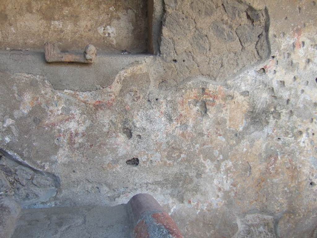 Villa of Mysteries, Pompeii. May 2006. Room 61, remains of painted plaster on north wall of kitchen lararium.