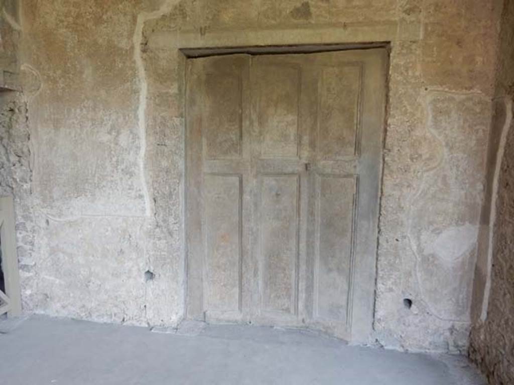 Villa of Mysteries, Pompeii. May 2015. Room 17, procoeton or anteroom with cast of shutters into room 16. Photo courtesy of Buzz Ferebee.

 
