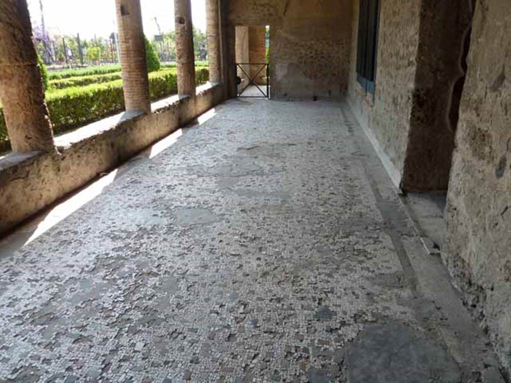 Villa of Mysteries, Pompeii. May 2010. Looking west along portico P1, towards doorway to room 9, cubiculum. The doorway of corridor F1 is on the right.