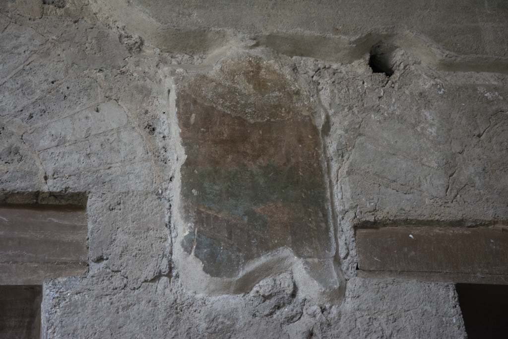 Villa of Mysteries, Pompeii. March 2019. 
Room 64, upper south wall with painted decoration between doorways to corridor F1, and room 3.
Foto Annette Haug, ERC Grant 681269 DÉCOR.

