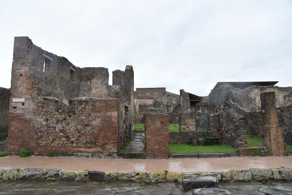 Via di Nola, north side, Pompeii. March 2018. Looking north towards entrance doorways at V.4.1, V.4.2 and V.4.3. 
Foto Annette Haug, ERC Grant 681269 DÉCOR.
