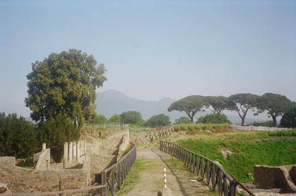 V.5.3 and V.5.4 Pompeii, on the east side of the insula. May 2010.  Looking north across the modern road bridge.  Photo courtesy of Rick Bauer.
