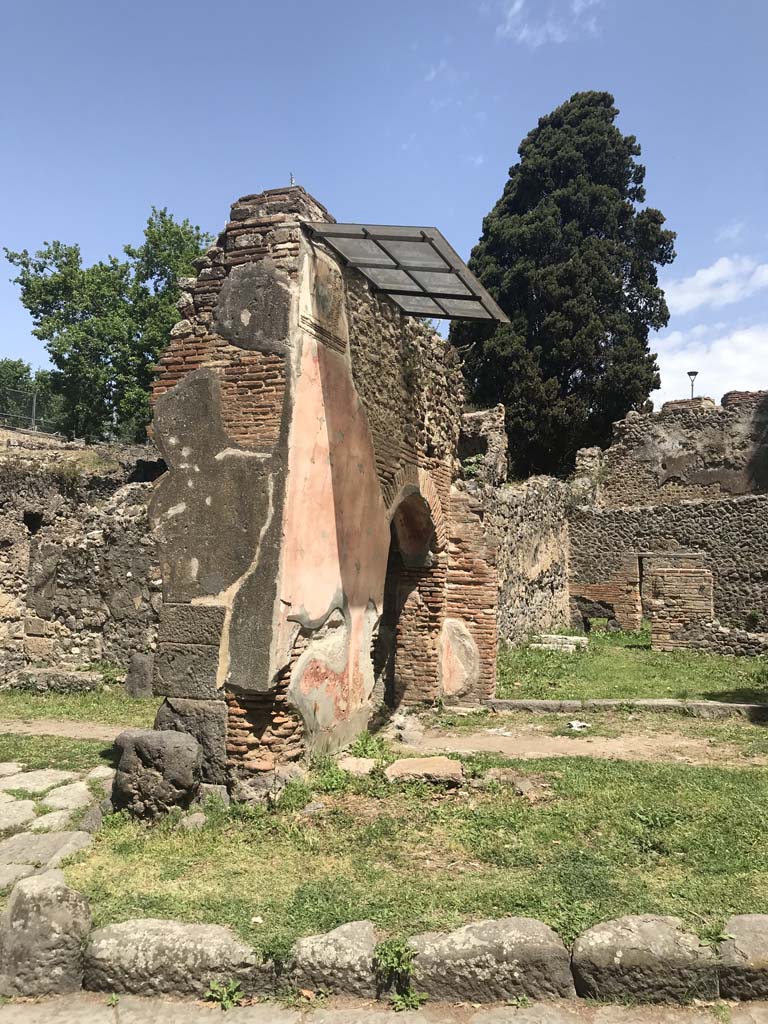 HGE14 Pompeii. April 2019. Looking east towards arch and north-east corner of shop. 
Photo courtesy of Rick Bauer.

