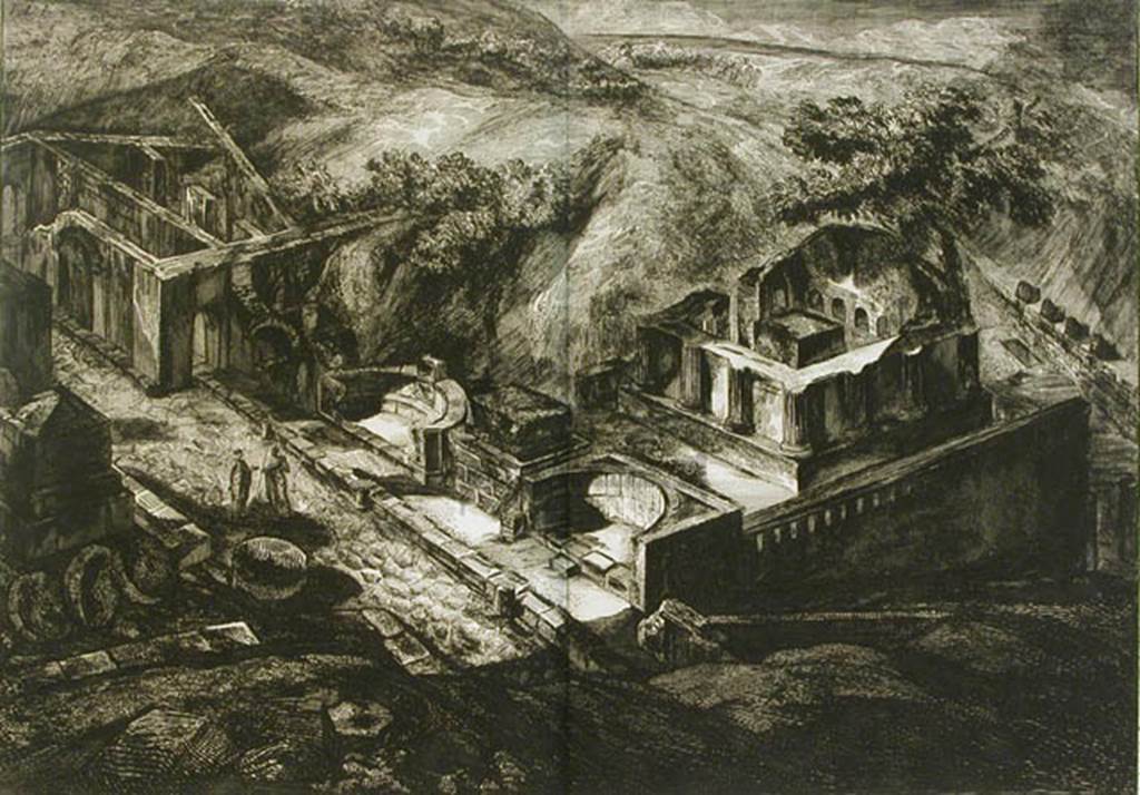 HGW01, HGW02, HGW03, HGW04 and HGW04a Pompeii. 1804 drawing of the fabric existing outside the Herculaneum Gate. See Piranesi, F, 1804. Antiquites de la Grande Grece: Tome I. Paris: Piranesi and Le Blanc. (Pl. 4). A marble plaque with an inscription was found set in a tufa block on the back of the schola on the 16th March 1763.

A VEIO M F IIVIR I D
ITER QVINQ TRIB
MILIT AB POPUL EX D D

According to Epigraphik-Datenbank Clauss/Slaby (See www.manfredclauss.de) this read
 
A(ulo) Veio M(arci) f(ilio) IIvir(o) i(ure) d(icundo)
iter(um) quinq(uennali) trib(uno)
milit(um) ab(!) popul(o) ex d(ecreto) d(ecurionum)      [CIL X 996]

According to Cooley this translates as 

To Aulus Veius, son of Marcus, duumvir with judicial power twice, quinquennial, military tribune by popular demand. By decree of the town councillors.

See Kockel V., 1983. Die Grabbauten vor dem Herkulaner Tor in Pompeji. Mainz: von Zabern. (p. 51).
See Cooley, A. and M.G.L., 2004. Pompeii : A Sourcebook. London : Routledge. (p. 139, G4).