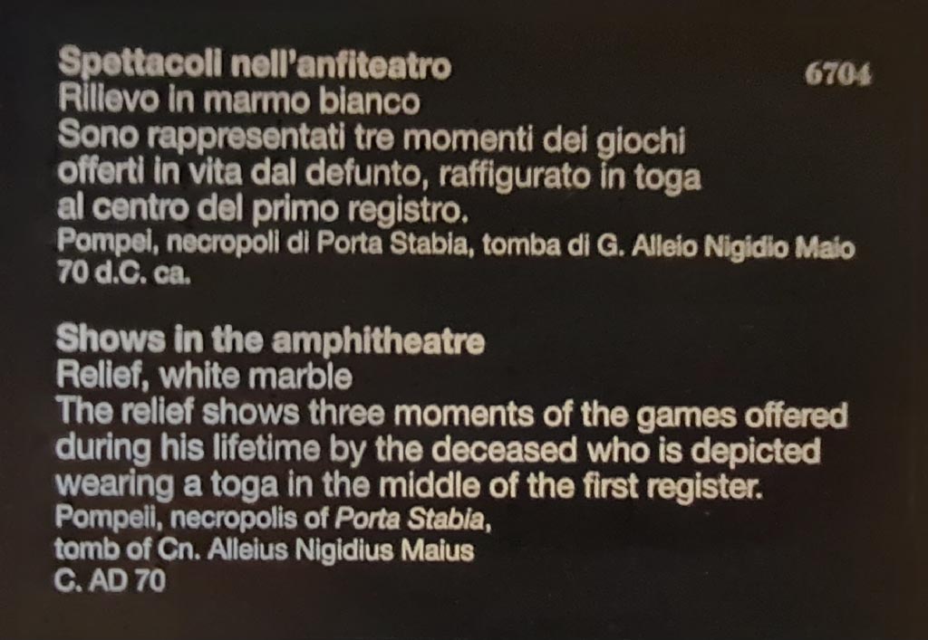 SG7 Pompeii. April 2023. Descriptive card in Naples Archaeological Museum. This clearly attributes this relief to the tomb of Gnaeus Alleius Nigidius Maius, tomb SG6.
Photo courtesy of Giuseppe Ciaramella.
