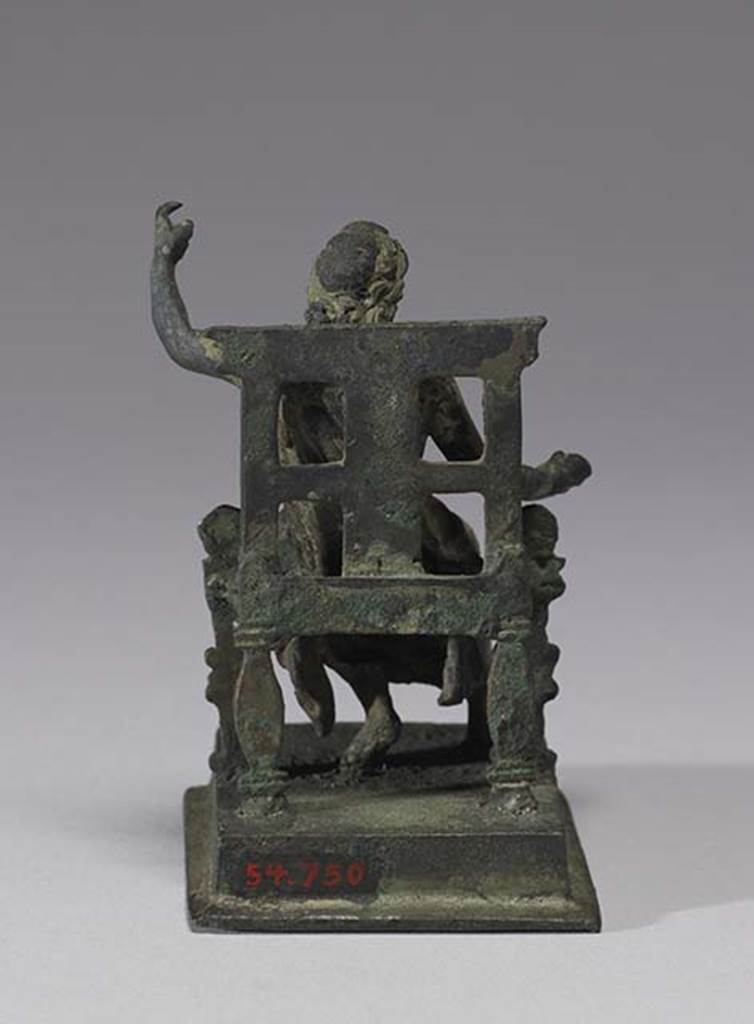 Boscoreale, Villa rustica in fondo DAcunzo. Room 12, lararium. 
Bronze statuette of seated Jupiter, rear view.
Photo courtesy of The Walters Art Museum, Baltimore. Inventory number 54.750.
http://thewalters.org/
Creative Commons Attribution-ShareAlike 3.0 Unported Licence

