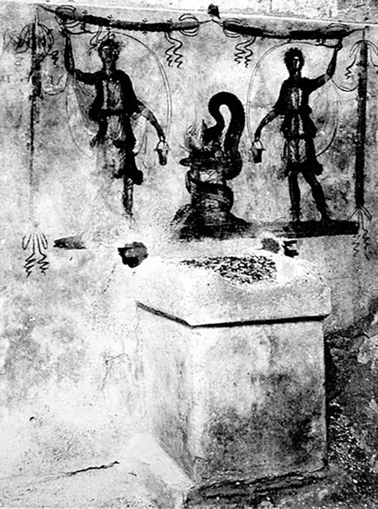 Pompeii, street altar on west side wall of I.11.1, May 2006. Painting above street altar.
Two large Lares were on the sides of a painted altar. 
Each held a cornucopia and a situla (bucket). 
A serpent coiled around the painted altar with its head in the fiery offering.
A garland was above each and one hung down each side.
See Fröhlich, T., 1991. Lararien und Fassadenbilder in den Vesuvstädten. Mainz: von Zabern. (F7, Taf 53,1).

