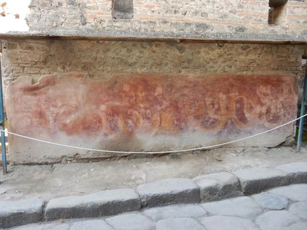 VII.11.13 Pompeii. May 2015. Painted street shrine on outside wall.  Photo courtesy of Buzz Ferebee.
