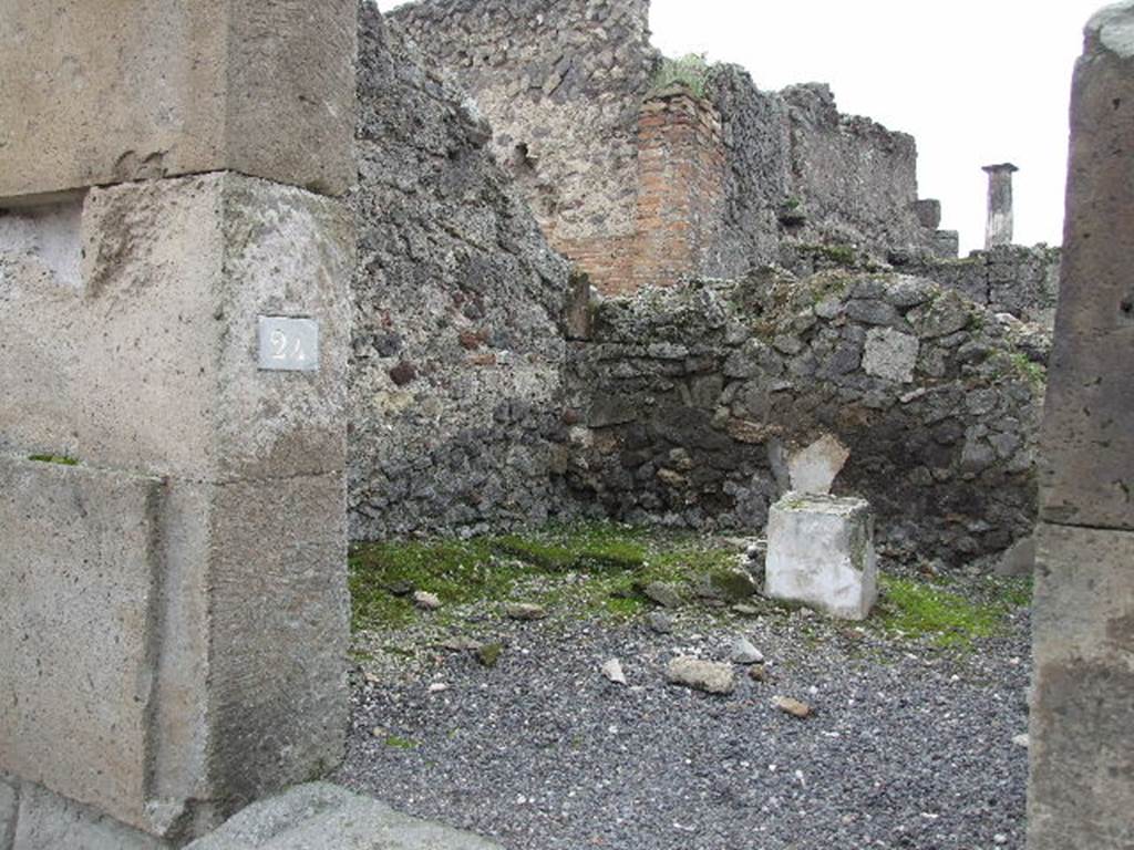 VIII.4.24 Pompeii.  Street altar.  December 2006.  South and west walls.
