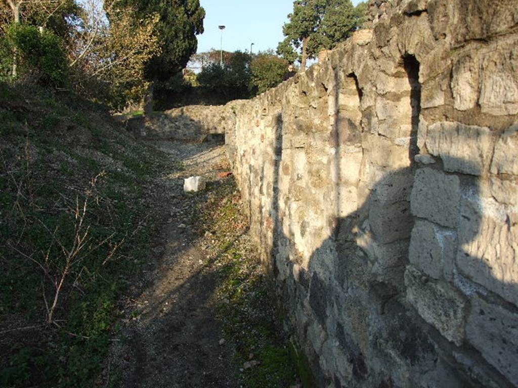 Via Pomeriale. December 2006. Looking east  towards the site of the street shrine and the Via dei Sepolcri.