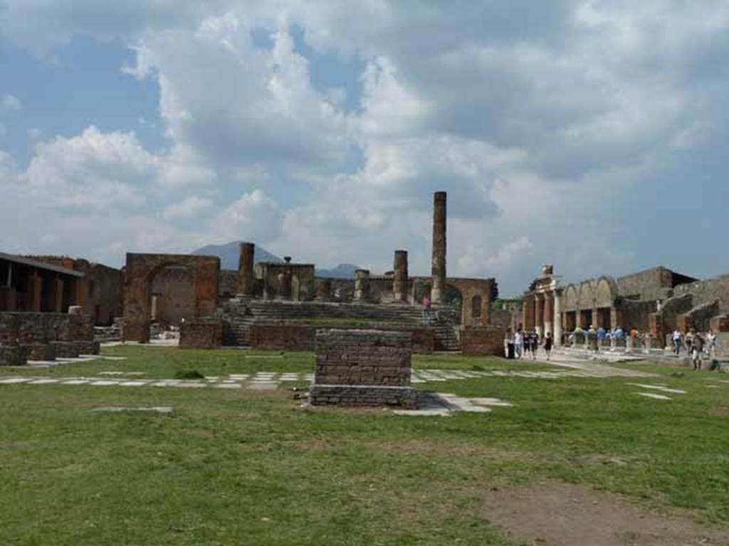 Forum looking north. May 2010. The remaining arch, attributed to Augustus, is still standing on the west side. The arch on the east side was attributed to Nero, so perhaps was demolished following his death and sentencing in 68AD.