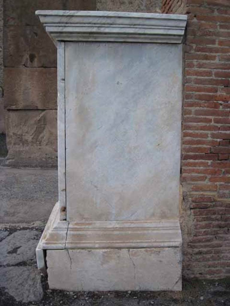 Arch of Marcus Holconius Rufus. September 2010. Detail of marble veneer on north-west pillar, south side. Photo courtesy of Drew Baker.