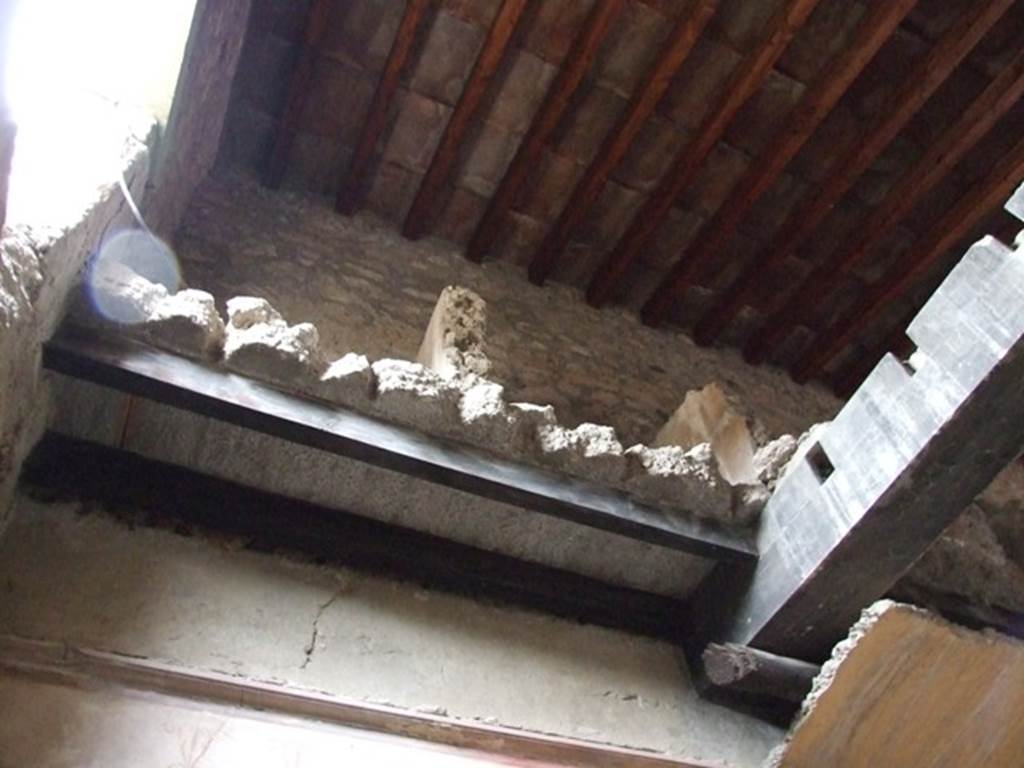 I.8.17 Pompeii. December 2007. Room 14, casts of upper floor timbers.