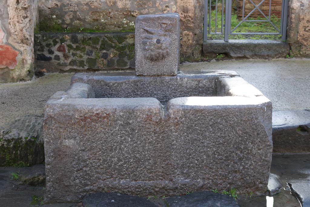 Fountain outside I.12.2 on Via dell’ Abbondanza. September 2019. Looking south.
Photo courtesy of Klaus Heese.
