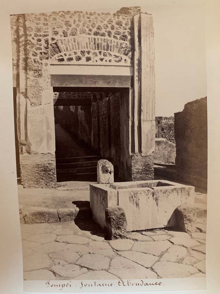 VII.9.67 Pompeii. Photograph by M. Amodio, from an album dated April 1878.
Looking north on Via dell’Abbondanza towards fountain. Photo courtesy of Rick Bauer.
