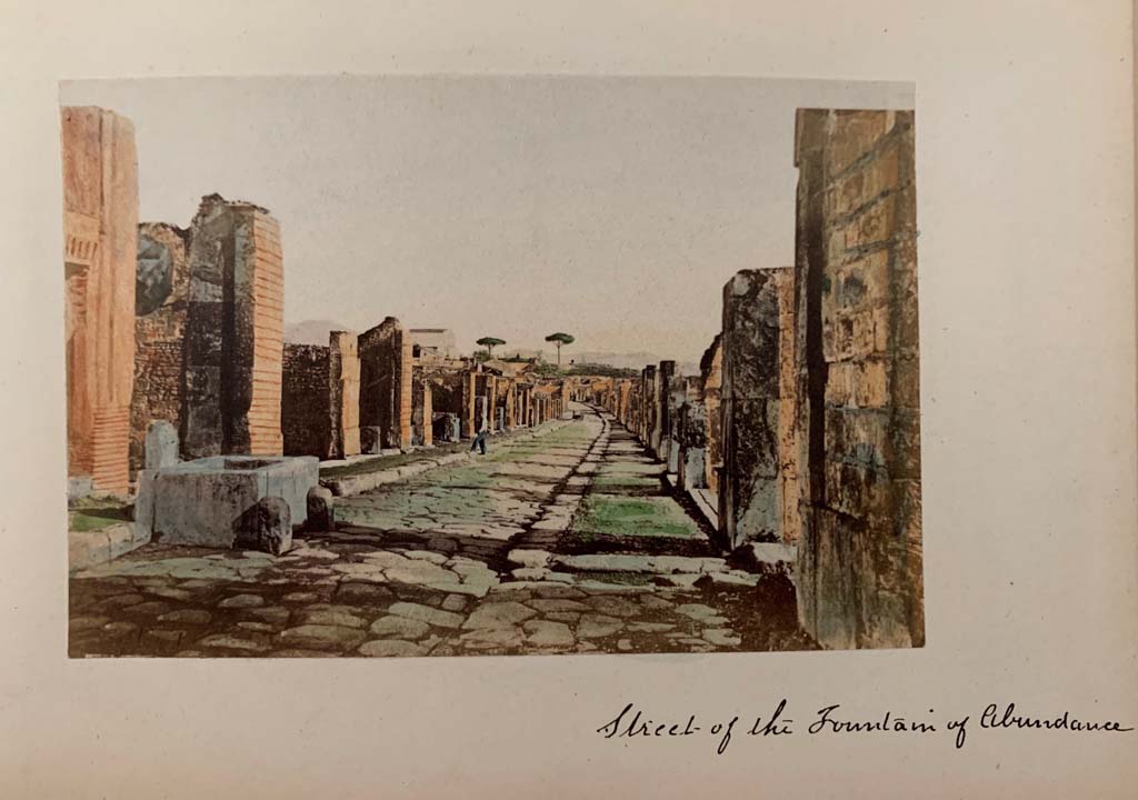 Fountain outside VII.9.67. Via dell’ Abbondanza, Pompeii. From a coloured album by M. Amodio, dated c.1880. Looking east. Photo courtesy of Rick Bauer.