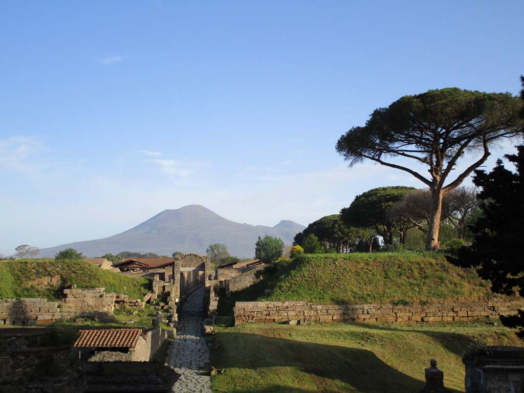 Pompeii Porta di Nocera. April 2019. Looking north to gate, city and Vesuvius still towering over.
 Photo courtesy of Rick Bauer.
