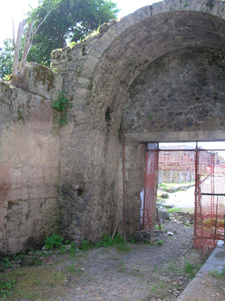 Pompeii Stabian Gate. September 2010. South east side. 
Cippus of L. Avianius Flaccus and Q. Spedius Firmus.
Photo courtesy of Drew Baker.

The Cippus at the Stabian Gate has the following inscription:-

L - AVIANVS - L - F - MEN
FLACCVS - PONTIANVS
Q - SPEDIVS - Q - F - MEN
FIRMVS - II - VIR - I - D - VIAM
A - MILLIARIO - A - D - GISIARIOS
QVA - TERRITORIVM - EST
POMPEIANORVM - SVA
PEC - MVNIERVNT

Lucius Avianius Flaccus Pontianus, son of Lucius, of the Menenian tribe and Quintus Spedius Firmus, 
son of Quintus, of the Menenian tribe, duumvirs with judicial power, 
paved the road at their own expense from the milestone to the station of the carriage drivers, 
where it is in Pompeii’s territory. (CIL.X1064 – ILS 5382)
