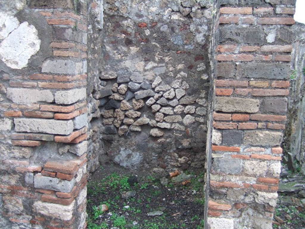 VIII.2.3 Pompeii. December 2005. Small room on north-west corner of the peristyle.  According to Boyce, off the north-west corner of the peristyle opened a small room which Mazois and Fiorelli called the lararium. See Boyce G. K., 1937. Corpus of the Lararia of Pompeii. Rome: MAAR 14. (p.74, no.342) 
