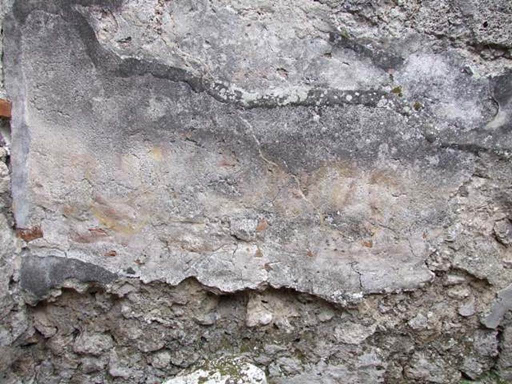 IX.1.12 Pompeii. December 2007.  Room in north west corner next to corridor.  Kitchen.  Is this the remains of the two painted snakes recorded by Helbig?  See Helbig, W., 1868. Wandgemälde der vom Vesuv verschütteten Städte Campaniens. Leipzig: Breitkopf und Härtel. (66).