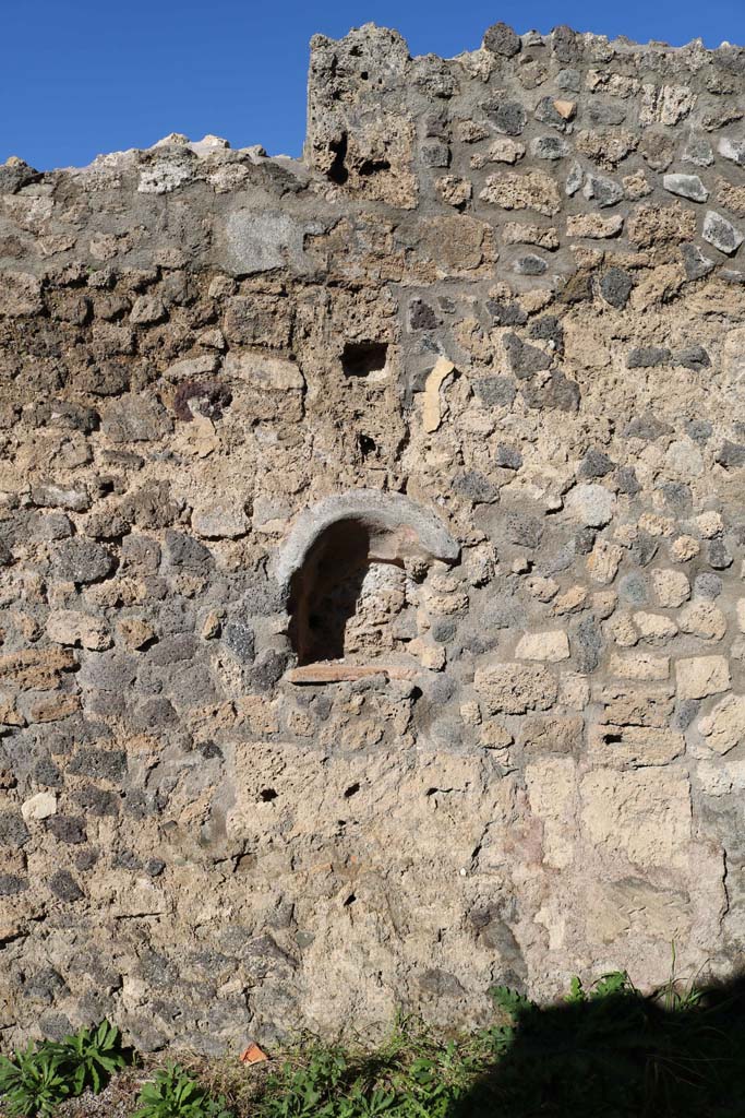 IX.2.11 Pompeii. December 2018. 
Looking towards niche on west end of north wall. Photo courtesy of Aude Durand.
