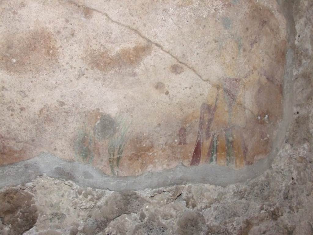 I.11.17 Pompeii. December 2007. Room 6, detail of south end of lararium painting in kitchen.