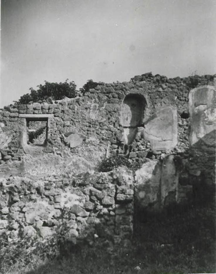10108-warscher-codex-81-640.jpg
I.1.8 Pompeii. 1936, taken by Tatiana Warscher.  Looking towards north wall.
According to Warscher, quoting Mau in Bull. Inst. 1875, p.30/31, along the north wall there were two rooms with windows overlooking the northern vicolo (now named Vicolo del Conciapelle), and a latrine nearer the stables at the north-east end. In the above photo, one could still see the latrine, situated on the upper floor, and a brick pipe from a third latrine, which was even higher up on the wall. See Warscher T., 1936. Codex Topographicus Pompeianus: Regio I.1, I.5. (no.15), Rome: DAIR, whose copyright it remains.

