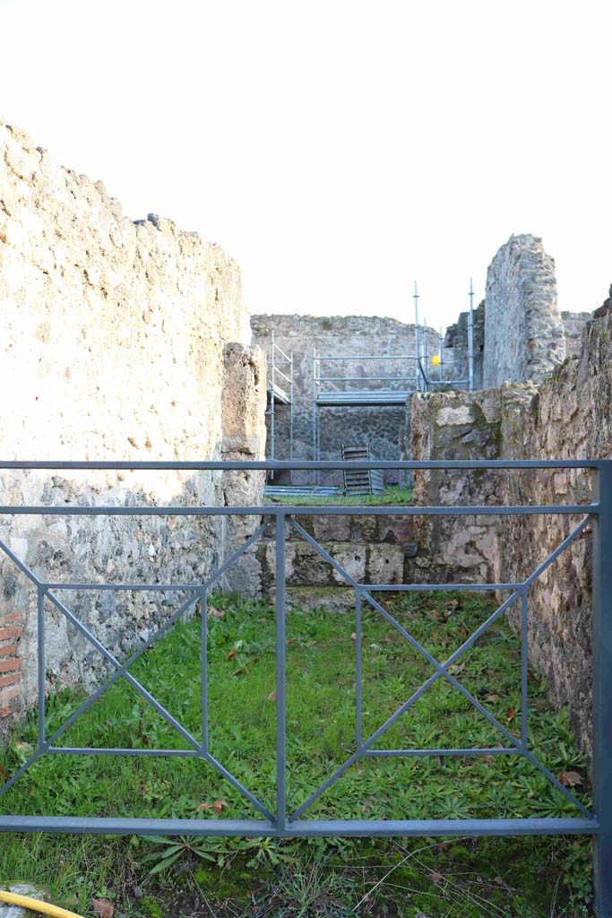 I.2.9 Pompeii. December 2018. Looking east across narrow shop. Photo courtesy of Aude Durand.