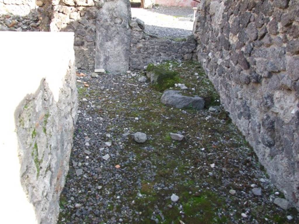 I.2.11 Pompeii.  December 2007. South wall with base (for wooden staircase?) in south east corner.