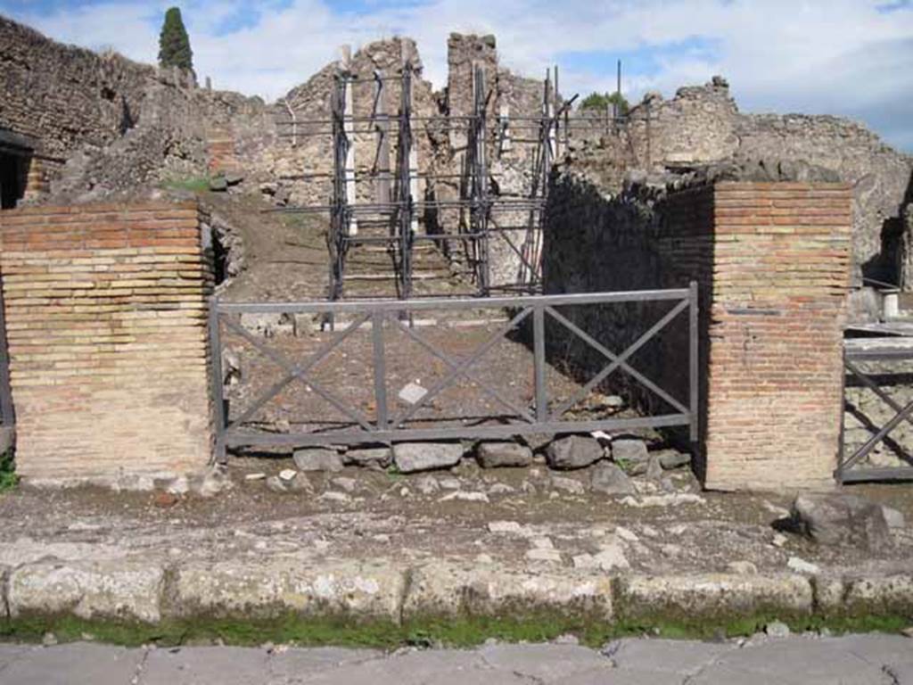 I.2.12 Pompeii. September 2010. Looking east to entrance doorway from Via Stabiana. Photo courtesy of Drew Baker.
