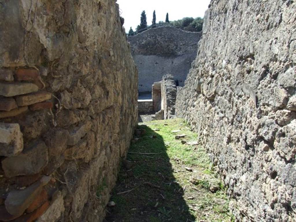 I.2.15 Pompeii. March 2009. Corridor on north-west side of atrium. This used to lead to the rear of the house above the cistern, but the area was badly hit by the bombing of 1943, and was destroyed.
