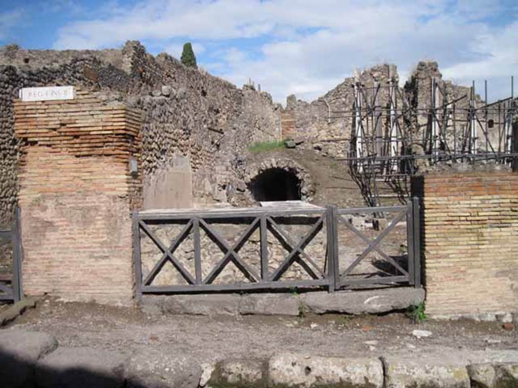 Copy of photo from I.2.13 Pompeii. September 2010. Looking east towards entrance doorway from Via Stabiana. Photo courtesy of Drew Baker. The upper part of the photo shows the area at the end of the corridor and remains of small room located on its south side, possibly behind the scaffolding.

