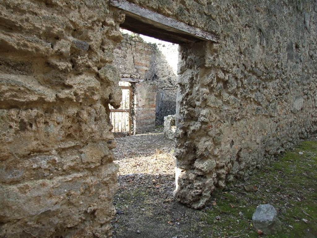 I.2.19 Pompeii. December 2006. Entrance.  According to Della Corte, there was a painted graffito found on the right hand side of this doorway, the words:
Q(uintum) Post(umium) aed(ilem) o(ro) v(os) f(aciatis)
Q(uintum) Postumium Pro
culum
aed(ilem)   Demetrius rog(at)     [CIL IV. 3359]    
See Della Corte, M., 1965.  Case ed Abitanti di Pompei. Napoli: Fausto Fiorentino. (p.272)


