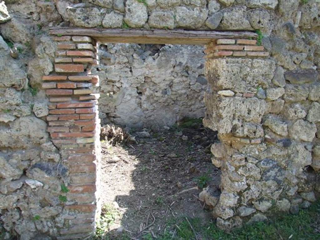 I.2.20 Pompeii.  March 2009.  Doorway to kitchen area. Looking south.