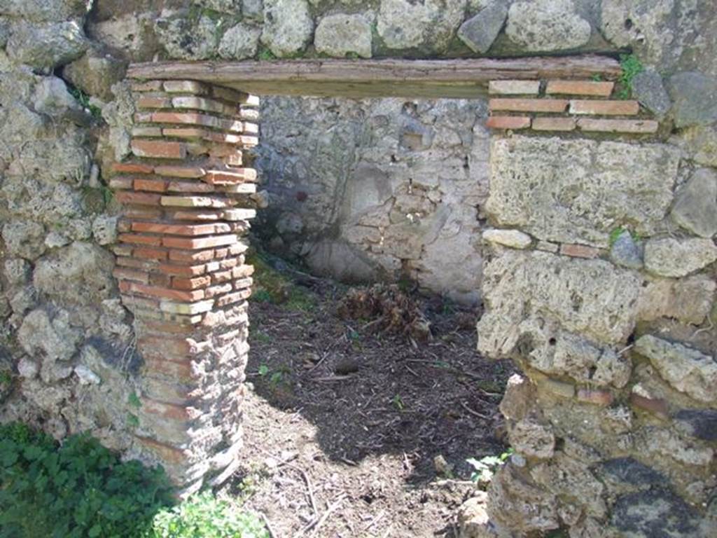 I.2.20 Pompeii.  March 2009. Doorway to Kitchen area.