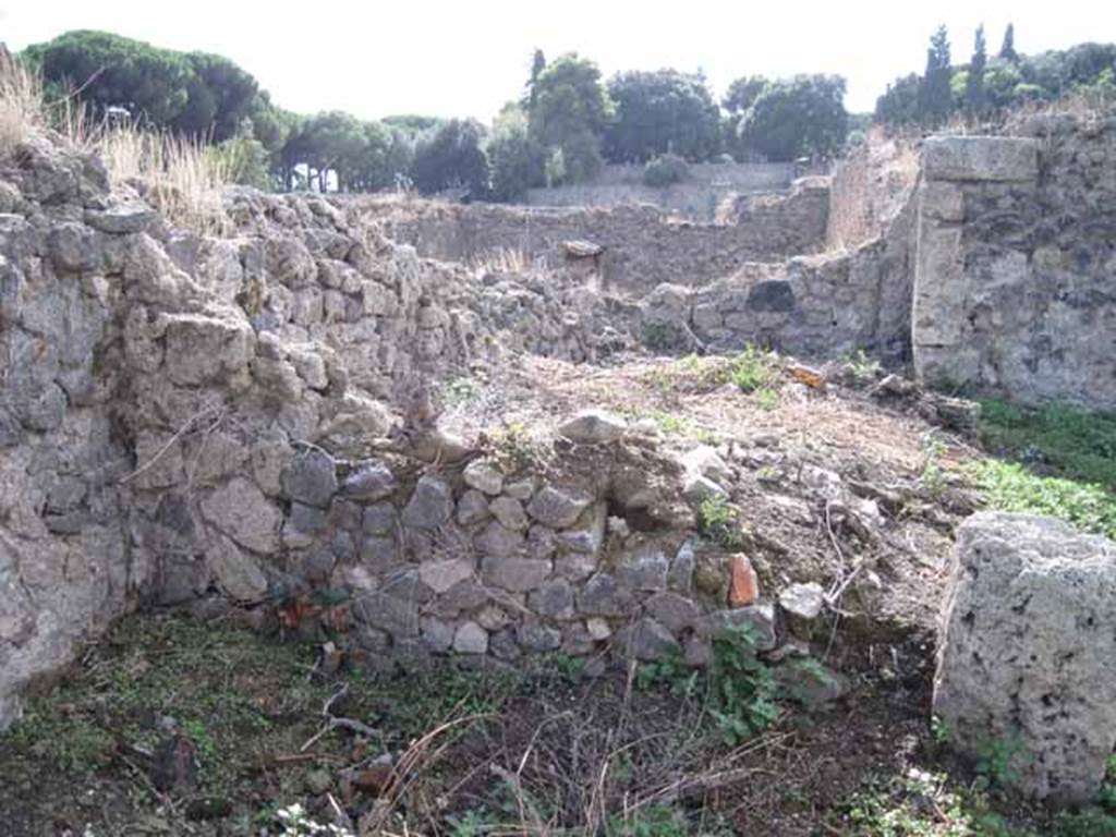 I.2.20 Pompeii. September 2010. Remains of west wall of triclinium, on the right would have been a staircase. Photo courtesy of Drew Baker.

