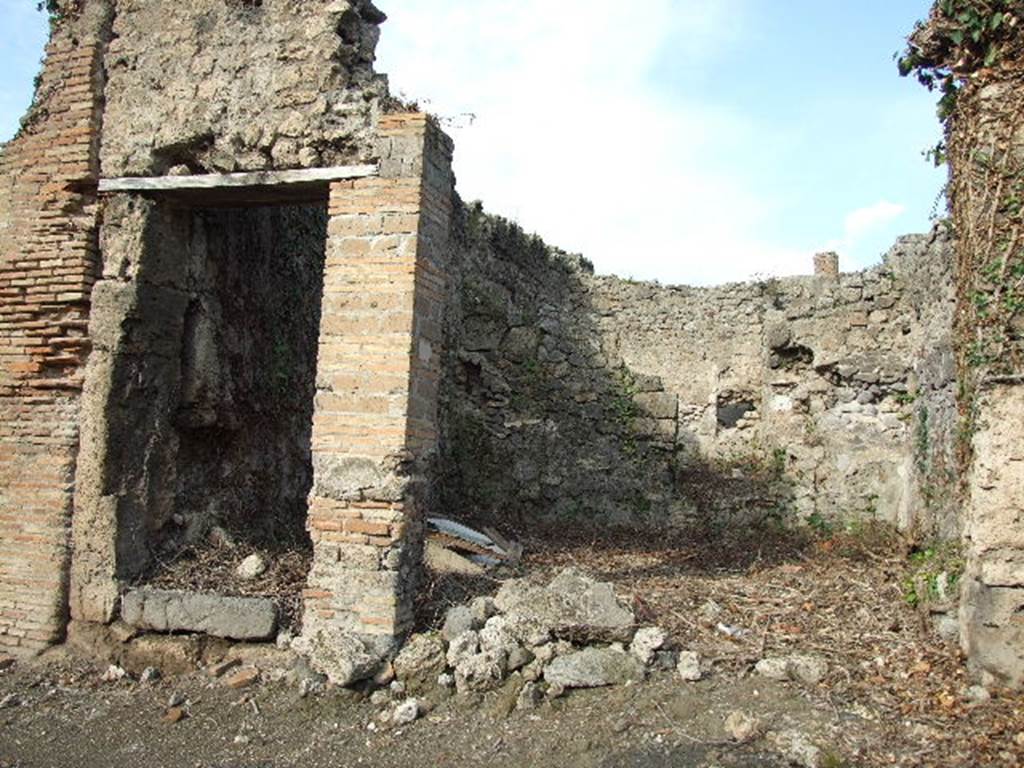 I.2.26 and I.2.25 Pompeii. December 2006. Entrance to steps to upper floor (on left).