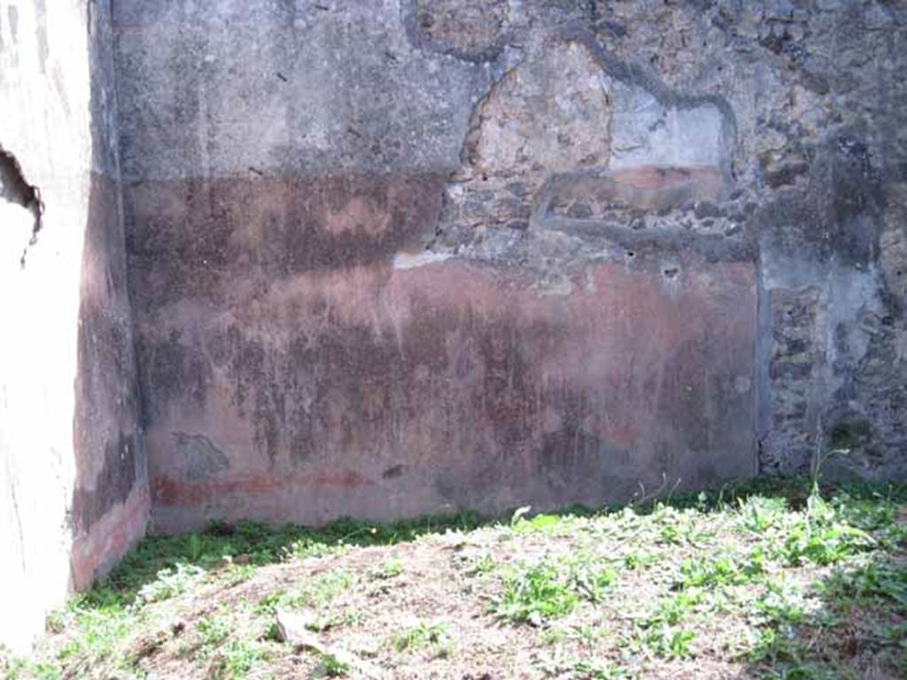 I.2.28 Pompeii. September 2010. South wall, of room on east side of corridor. 
The doorway to the corridor would have been in the west wall, on the right. Photo courtesy of Drew Baker.

