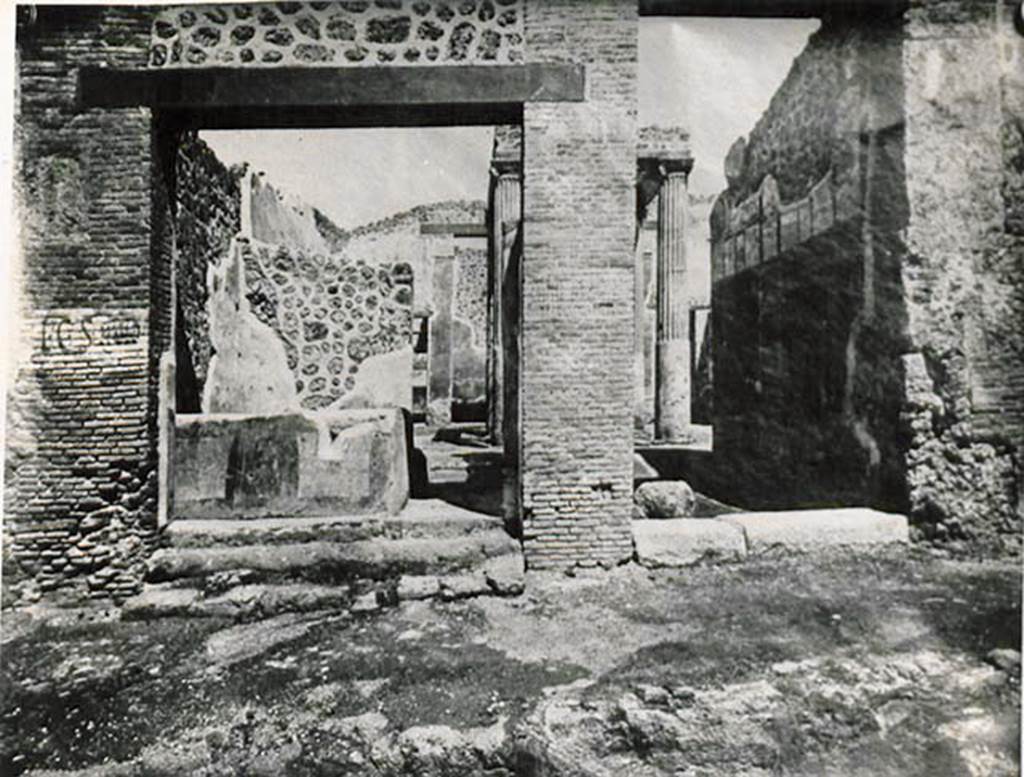 I.2.29 Pompeii. Riproduzione di un vecchia fotografia. Looking north to entrance doorways, 1.2.29 on the left, I.2.28 on the right. 
See Warscher T., 1935. Codex Topographicus Pompeianus: Regio I.2. (no.48), Rome: DAIR, whose copyright it remains.

