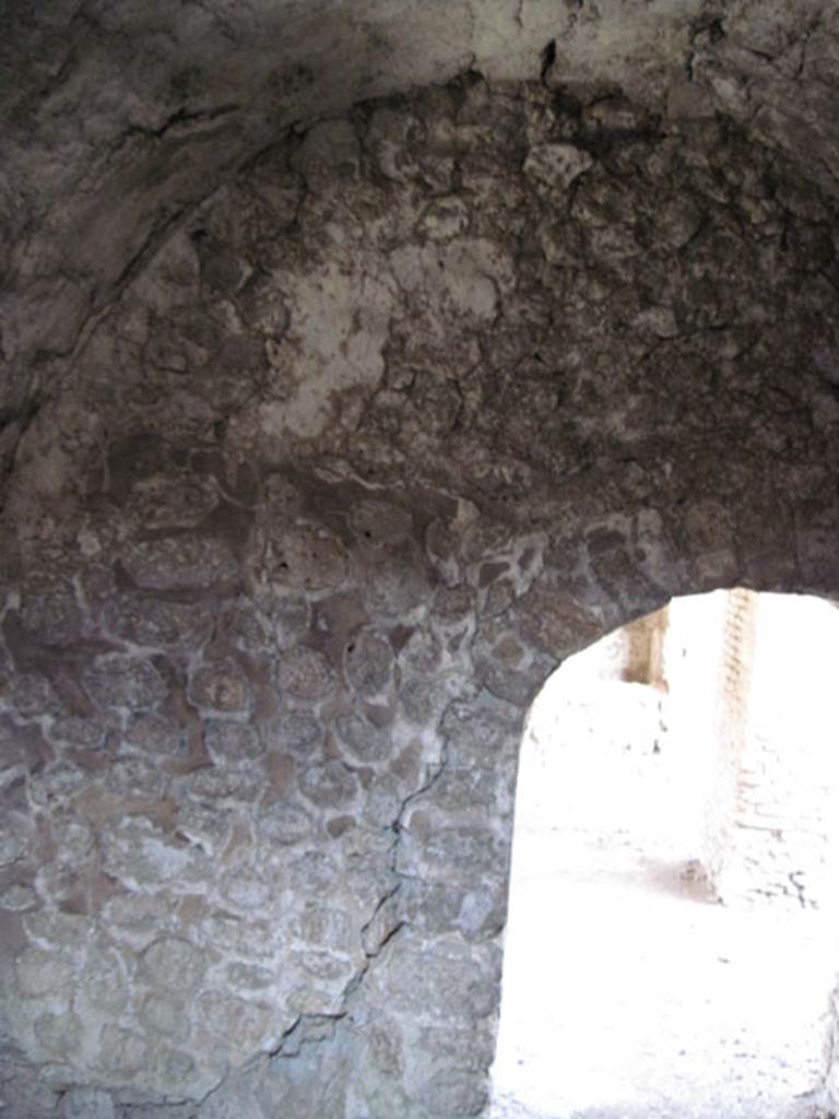 I.3.3 Pompeii. September 2010. Upper part of west wall of storeroom showing vaulted ceiling. Photo courtesy of Drew Baker.
