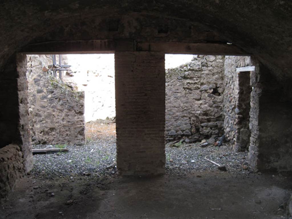 I.3.3 Pompeii. September 2010. North wall of kitchen showing two doorways leading into a wider corridor. Photo courtesy of Drew Baker.
