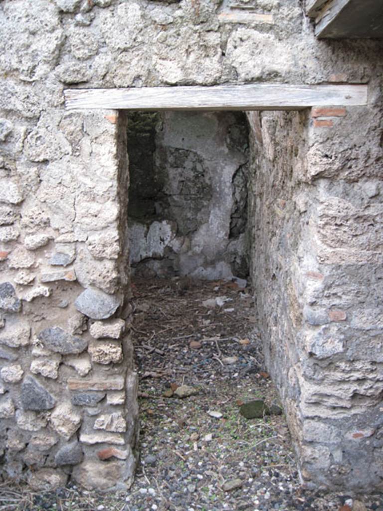 I.3.3 Pompeii. September 2010. Looking east towards doorway into small room, possibly “il repositorio” as described by Fiorelli. Photo courtesy of Drew Baker.

