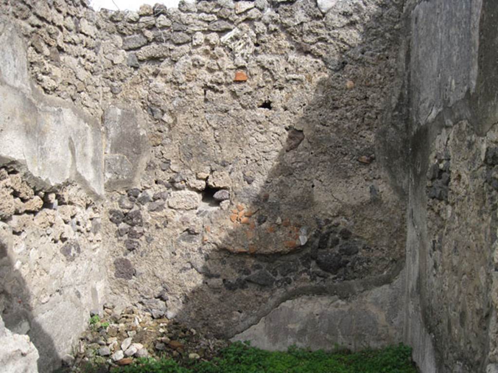 I.3.3 Pompeii. September 2010. Upper peristyle area, east wall of cubiculum reached by central doorway of the three above.  Photo courtesy of Drew Baker.
