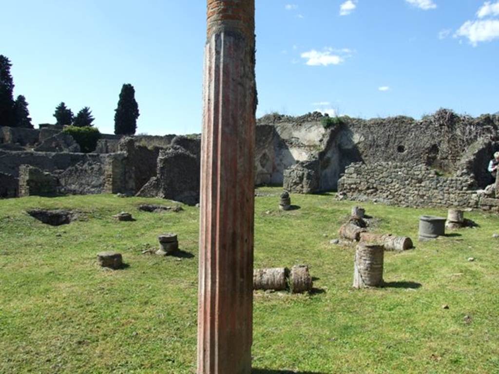 1.3.3 Pompeii.  March 2009. Looking north west across peristyle area.  Note the red painted stucco on the column.