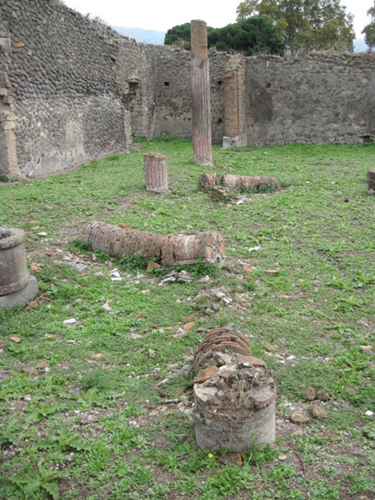 I.3.3 Pompeii. September 2010. Upper peristyle area, looking south along east side of peristyle, with overview of columns. Photo courtesy of Drew Baker.
According to Fiorelli, 
on another column in the opposite row, towards the eastern side, was written:
Q  SPVRENNIVS PRISCVS
    PRIM   PILAR
                 PILAR
See Pappalardo, U., 2001. La Descrizione di Pompei per Giuseppe Fiorelli (1875). Napoli: Massa Editore. (p.38)
According to Epigraphik-Datenbank Clauss/Slaby (See www.manfredclauss.de), CIL IV 3992 read as –
Q(uintus) Spurennius Priscus
prim(i)pilar(is)
(primi)pilar(is)
According to Mau, “To the same division of the Army probably belonged a centurion of the first rank, Q. Spurennius Priscus, whose name was found in a house at I.III.3”
A similar description was found in VIII.3.21 and related to the fifth praetorian cohort, of the century led by Martialis.
See Mau, A., 1907, translated by Kelsey F. W. Pompeii: Its Life and Art. New York: Macmillan. (p.492)

