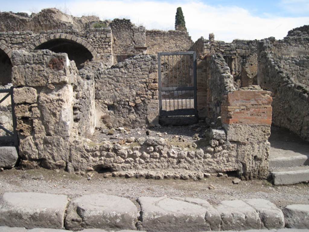 I.3.4 Pompeii. September 2010. Looking east across Via Stabiana towards entrance doorway. Photo courtesy of Drew Baker. 
According to CTP, the street entrance was walled up as of April 1982. See Van der Poel, H. B., 1986. Corpus Topographicum Pompeianum, Part IIIA. Austin: University of Texas. (p.6)

