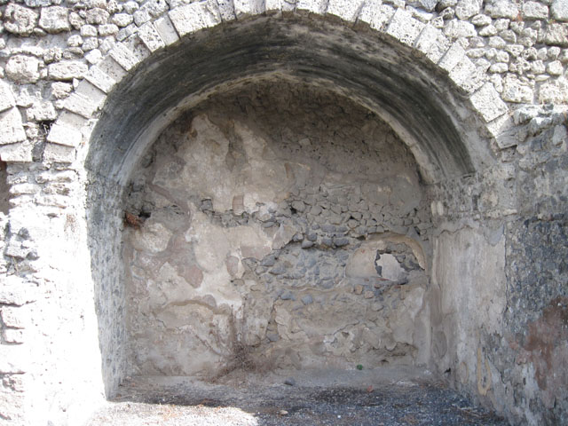 I.3.5 Pompeii. September 2010. North wall of rear vaulted room with doorway into a rear room. This room now appears to be part of I.3.6, as the north and west wall have disappeared.  Photo courtesy of Drew Baker.
