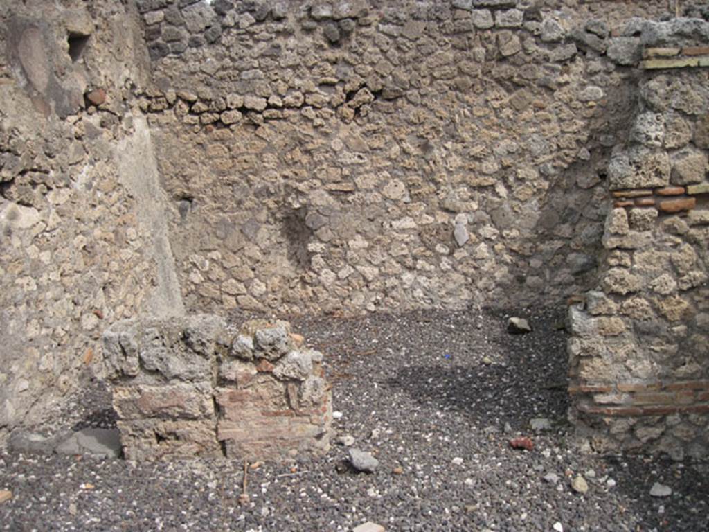 I.3.12 Pompeii. September 2010. The east wall of the shop-room with two doorways can be seen towards the lower side of the image. Photo courtesy of Drew Baker.
