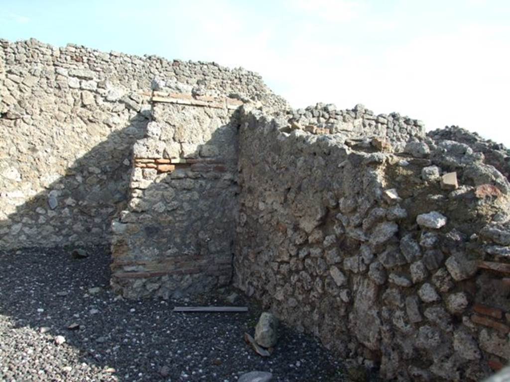 I.3.12 Pompeii. December 2007. South wall and doorway to rear room in south-east corner.